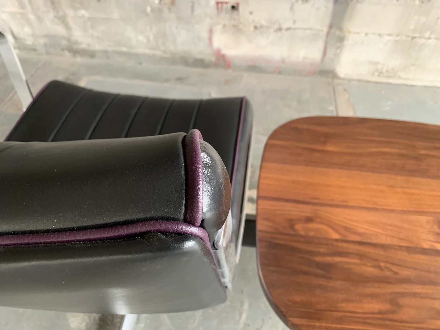 Black Grapevine Langlitz Leather Studio Couch with Black Walnut Table